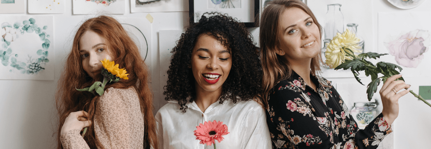 Three women celebrating authentic friendship, healthy boundaries, and recovering from nice girl syndrome and people-pleasing.